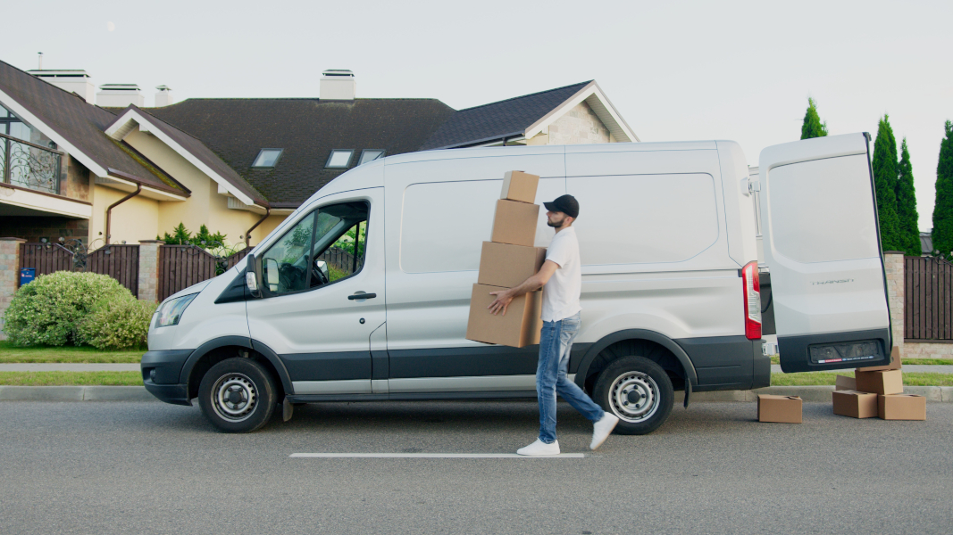 Man with a van services photo. Just move employee delivering goods.